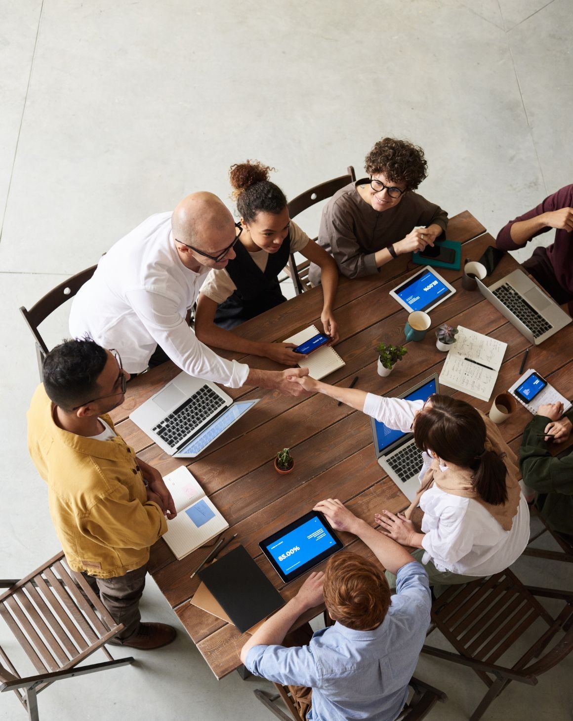 people working together on a facebook advertising strategy