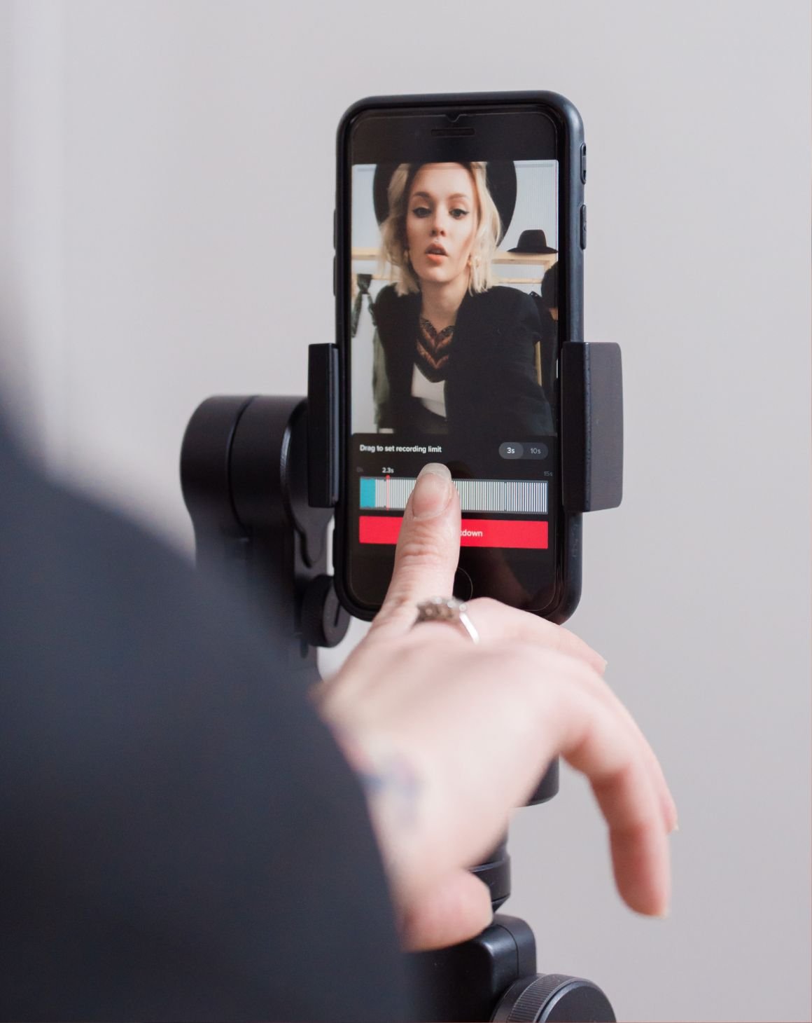 woman-recording-on-cell-phone