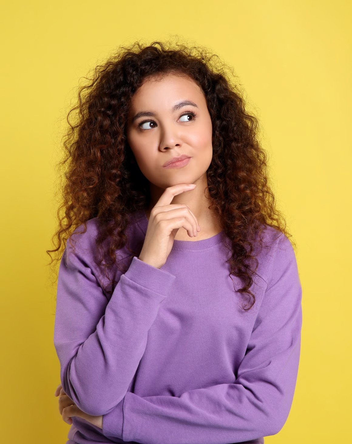 an image of a girl with long curly hair thinking about why more is not always better online